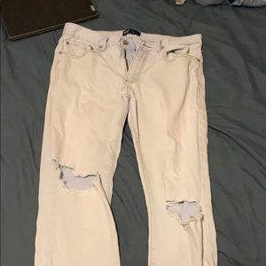 light blue skinny jeans with rips